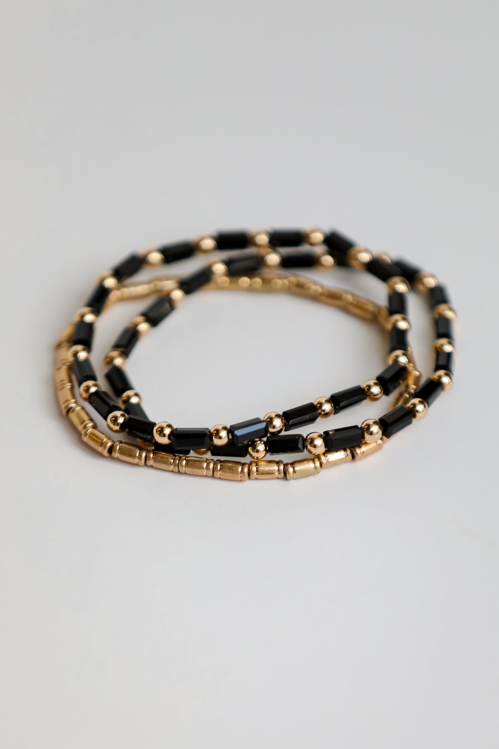 shopdressup_black_beaded_bracelet_set-3_63f9d549-ef87-4539-82d5-659e6b2dc532.jpg