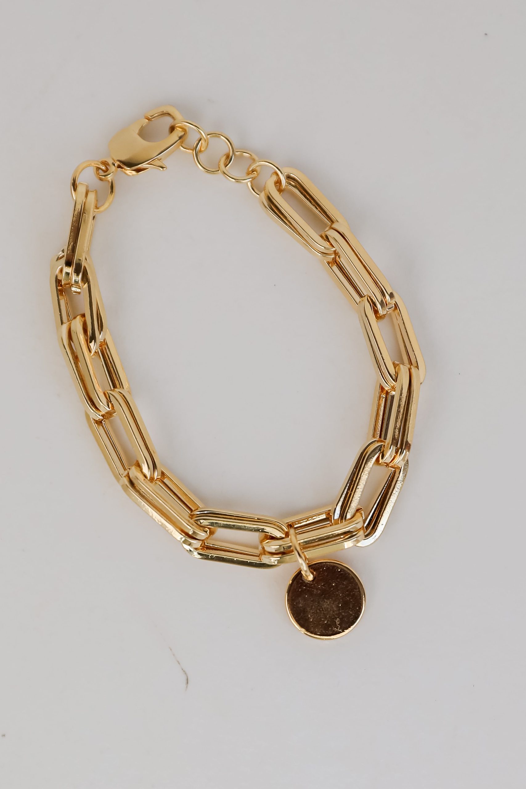shopdressup_gold_chain_bracelet-3_47cd4f21-eaad-4c6d-a6ce-1f4d1847191f.jpg