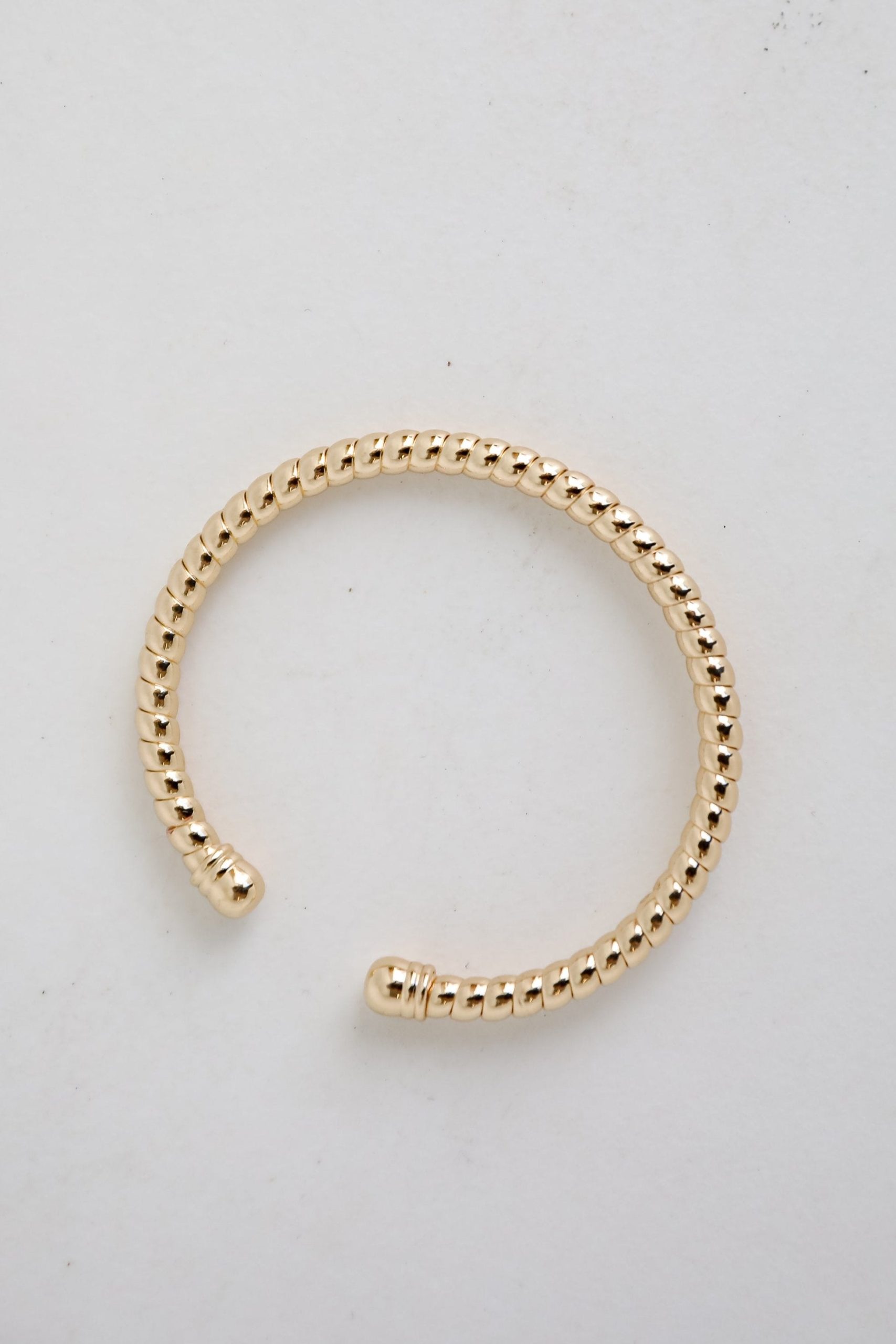 shopdressup_gold_twisted_cuff.jpg